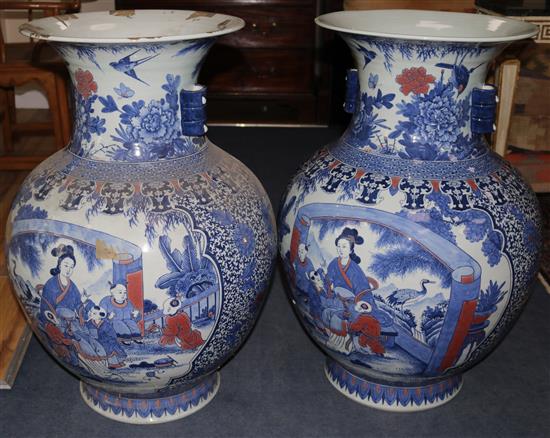 A pair of large Chinese underglaze blue and copper red vases, H.83cm